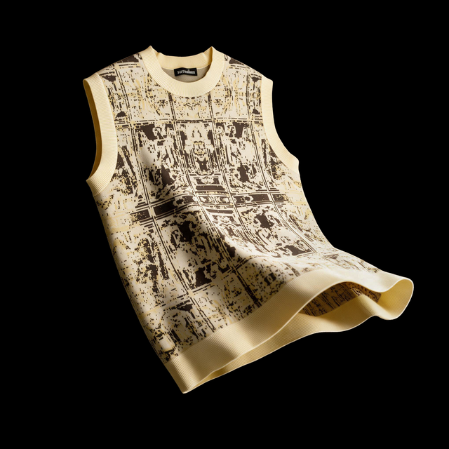 Sleeveless jacquard knit sweater vest in pale yellow with a pixelated renaissance tapestry pattern in olive and brown