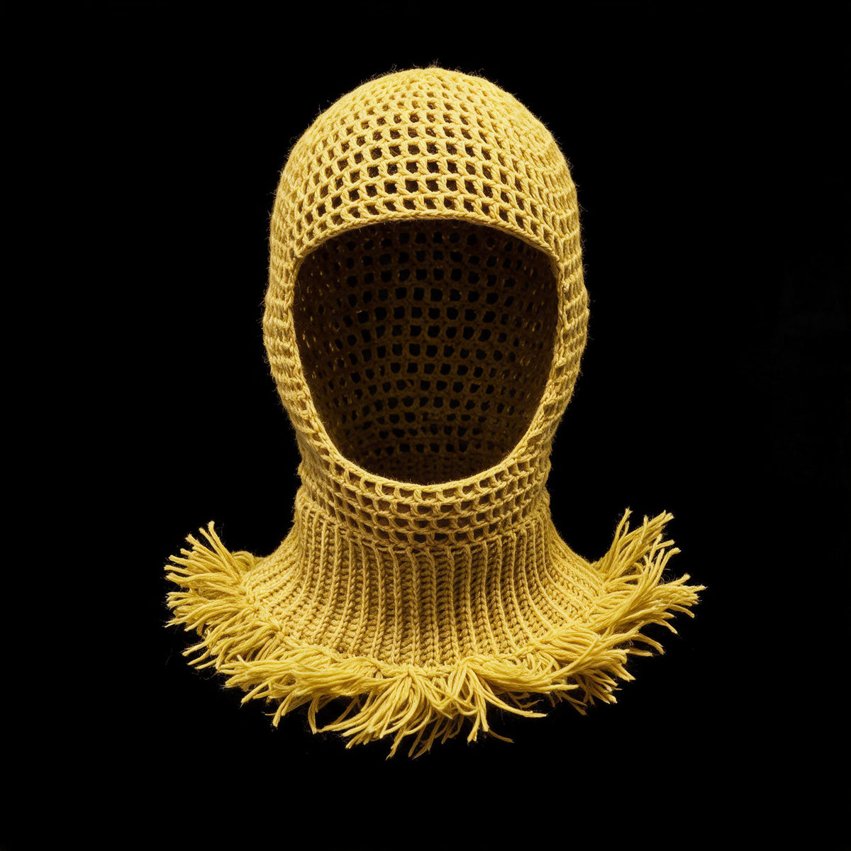 Yellow crochet balaclava with open mesh hood and fringed collar on black