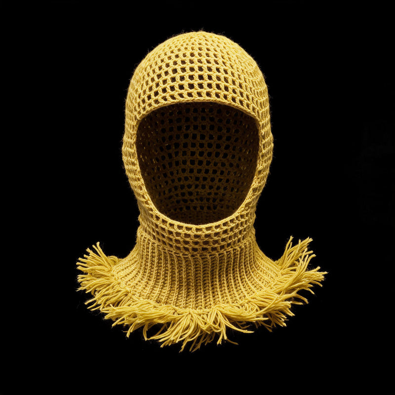 Yellow crochet balaclava with open mesh hood and fringed collar on black