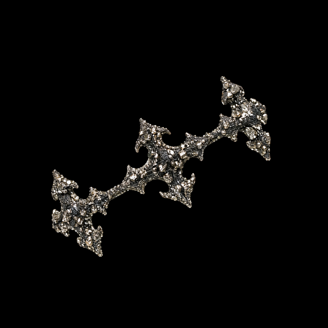 Star shaped Pyrite Star Grillz encrusted with raw crushed crystal in a pale silver tone