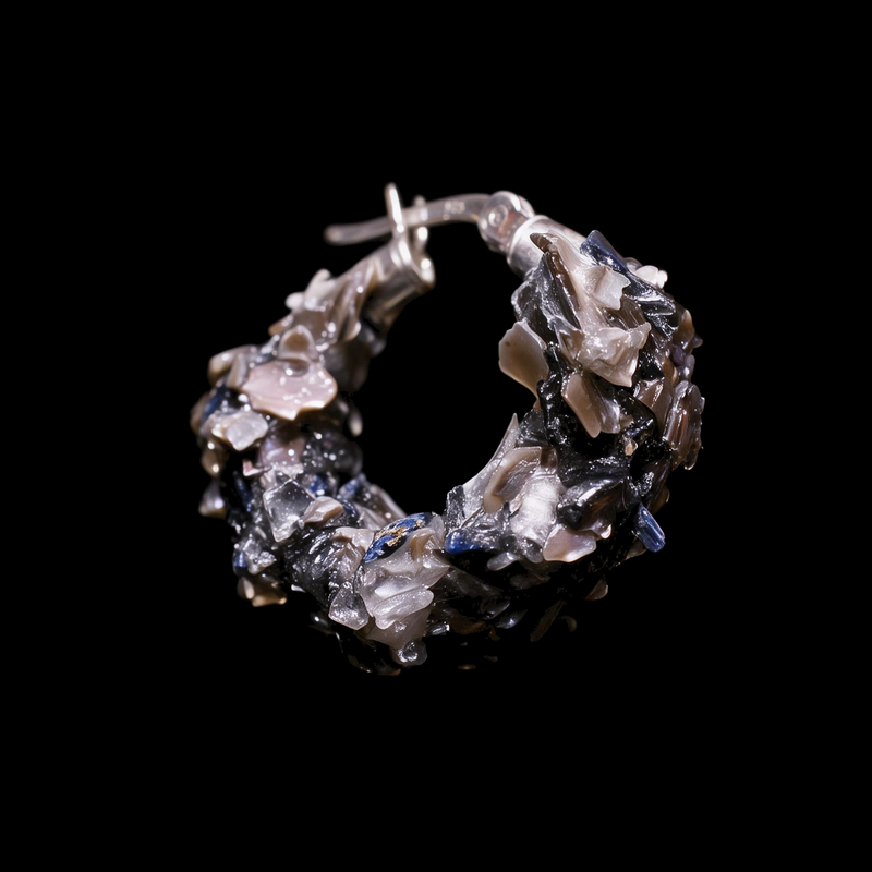 Sterling silver hoop earring encrusted with crushed shell and stone chips in pink, gray and black tones