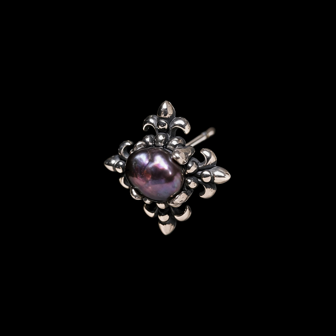 Sterling silver otherworldly gothic stud earring framing a dark iridescent baroque pearl in fleur de lis points