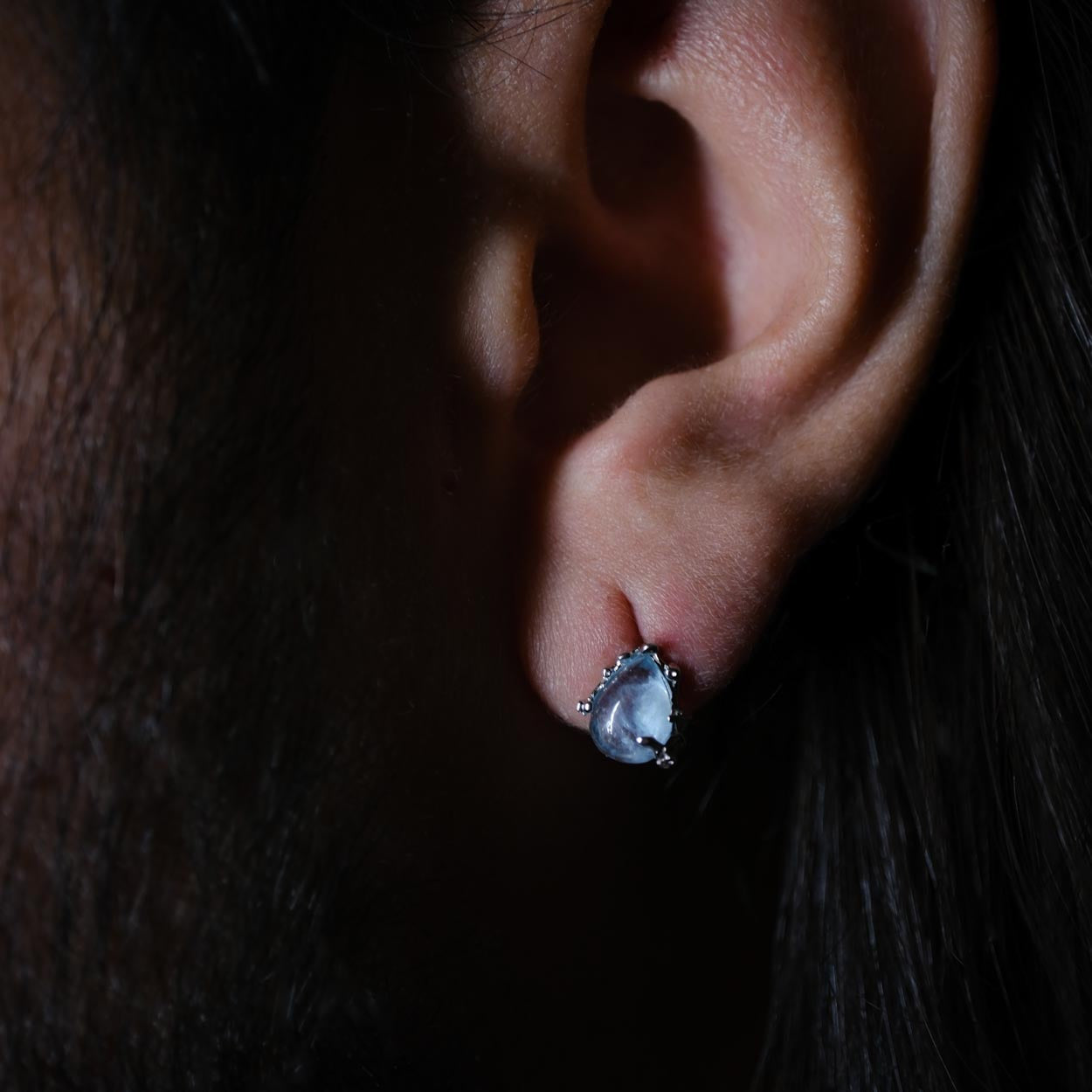 Surrealium Aqua earring packaging detail shot